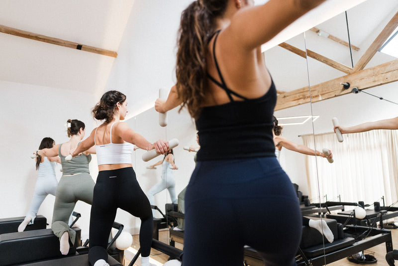 Standing reformer exercises at Radiant Woodbury