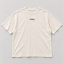 Front flat lay of cream oversized Pilates T-shirt with small olive Radiant logo