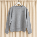 Grey marl Radiant Studio Crewneck with small navy chest logo