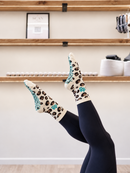 Wild Thing Pilates grip socks - studio legs raised