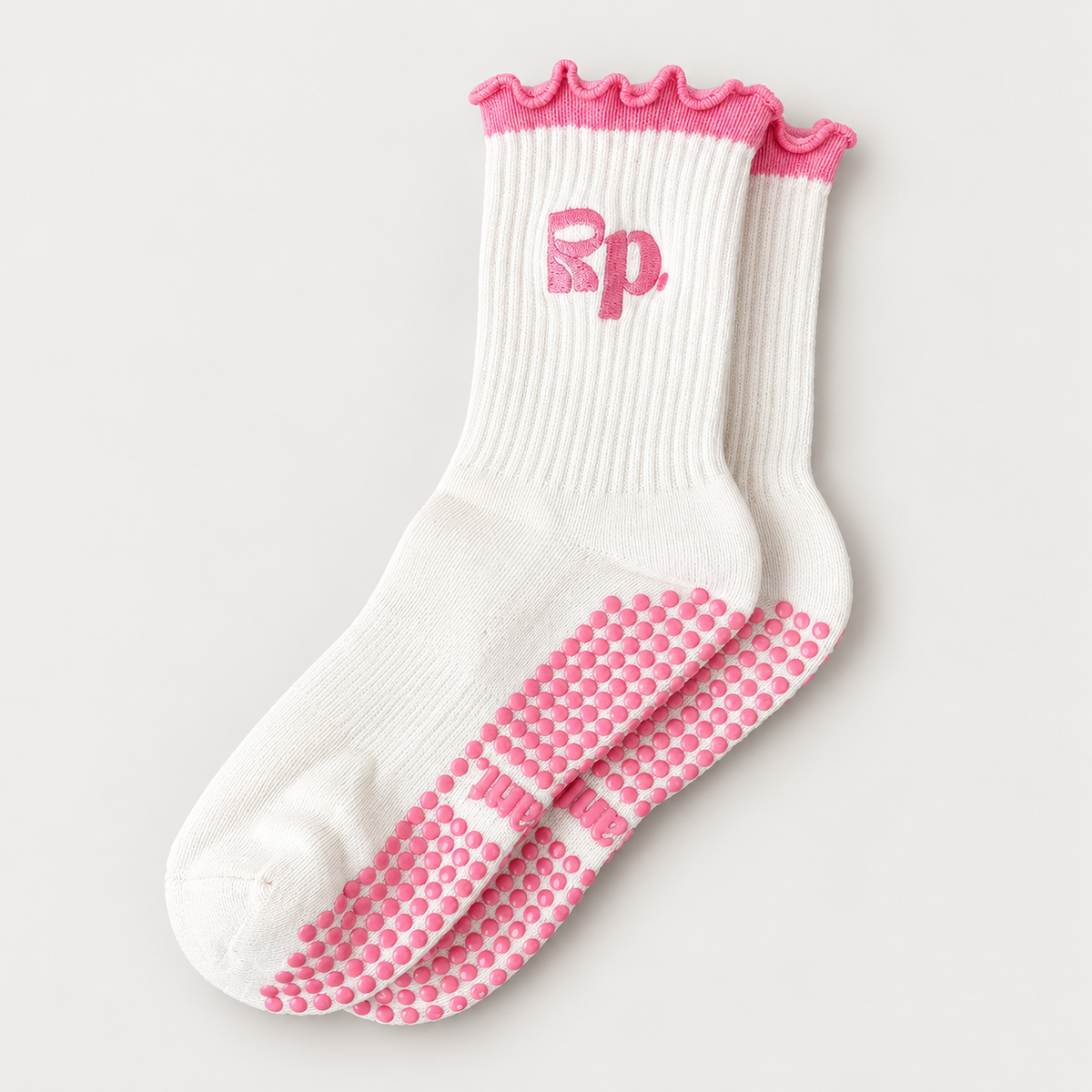 Studio Sweetheart 2.0 Pilates grip socks in white & pink, showing cuff details and dotted grip soles